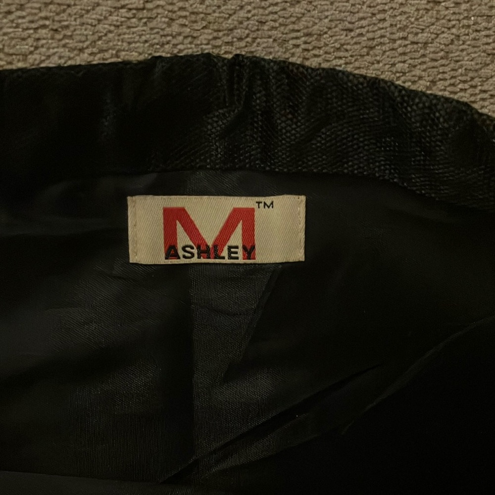 Black Drawstring Backpack With Decorative Design - image 2